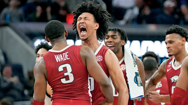 Arkansas forward Jaylin Williams celebrates a big play during an upset of No. 1 Gonzaga in the NCAA Tournament.